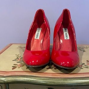 Red patent leather Steve Madden pumps